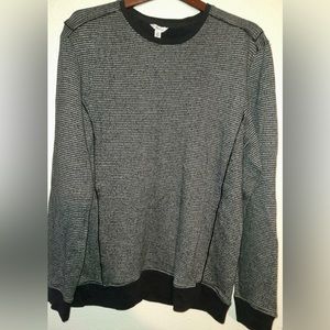 Beautiful Calvin Klein sweater. With leather detailing.